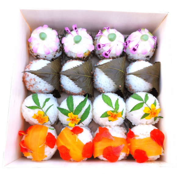 Plateau signature végétale composé de temari sushis (sushis ronds) farcis et décorés avec élégance
